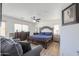 Spacious main bedroom boasts furniture, a ceiling fan, and plenty of natural light at 3788 E Sexton St, Gilbert, AZ 85295