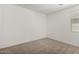 Bedroom featuring neutral carpet and bright natural light from the window at 4034 W Nora Dr, San Tan Valley, AZ 85144