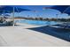 Community Pool with lap lanes, lounge chairs, and clear blue water on a sunny day at 4034 W Nora Dr, San Tan Valley, AZ 85144