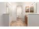 Bright bathroom with tile flooring, a vanity, and partitioned space at 4107 W Campo Bello Dr, Glendale, AZ 85308