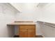 Walk-in closet with a countertop, storage space, and racks at 4107 W Campo Bello Dr, Glendale, AZ 85308