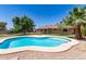 Inviting swimming pool with a lounging area offers a perfect outdoor oasis at 4107 W Campo Bello Dr, Glendale, AZ 85308