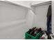 A walk-in closet featuring shelving with an organizing system and plenty of storage space at 41800 W Sonoran Trl, Maricopa, AZ 85138