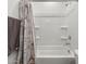 This bathroom features a pristine white shower and a stylish Paris-themed shower curtain at 41800 W Sonoran Trl, Maricopa, AZ 85138