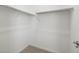 Spacious walk-in closet offering ample storage with shelving and rods for organization at 41800 W Sonoran Trl, Maricopa, AZ 85138