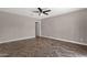 Spacious bedroom featuring unique wood floors and a ceiling fan at 4216 N 20Th St, Phoenix, AZ 85016