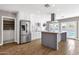 Modern kitchen with stainless steel appliances and center island at 4216 N 20Th St, Phoenix, AZ 85016