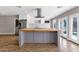 Open kitchen featuring stainless steel appliances and center island at 4216 N 20Th St, Phoenix, AZ 85016
