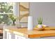 Bright breakfast nook featuring butcher block counters, decorative lighting, and natural light from nearby windows at 4216 N 20Th St, Phoenix, AZ 85016