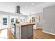 View of the kitchen island, stainless hood vent, and an attached dining area at 4216 N 20Th St, Phoenix, AZ 85016