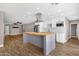 Open concept kitchen with stainless steel appliances and modern island at 4216 N 20Th St, Phoenix, AZ 85016