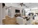 Bright living room with ceiling fans, modern furnishings, and hardwood floors offers a relaxing space at 4216 N 20Th St, Phoenix, AZ 85016