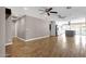 Bright and spacious living room featuring wood-look tile floors and ceiling fans at 4216 N 20Th St, Phoenix, AZ 85016