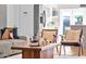 Cozy living room featuring hardwood floors, stylish furniture, and bright, airy atmosphere at 4216 N 20Th St, Phoenix, AZ 85016