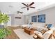 Inviting living room boasts a comfortable sofa, wood floors, ceiling fans and decorative furniture at 4216 N 20Th St, Phoenix, AZ 85016