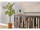 Tastefully decorated living room featuring stylish wood cabinet, decorative plant, and modern art at 4216 N 20Th St, Phoenix, AZ 85016