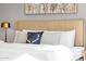 Comfortable bedroom showcasing stylish headboard, plush pillows, and neutral decor at 4216 N 20Th St, Phoenix, AZ 85016