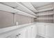 Bright pantry featuring ample shelving and cabinet storage space at 4216 N 20Th St, Phoenix, AZ 85016