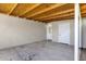 Covered patio with concrete floor, block wall, white trim, and a closed white exterior door at 4216 N 20Th St, Phoenix, AZ 85016