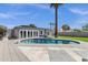 A refreshing private pool with a basketball hoop, a patio area, and lush palm trees at 4216 N 20Th St, Phoenix, AZ 85016