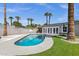 A stunning private pool with basketball hoop, patio and palm trees, perfect for entertaining at 4216 N 20Th St, Phoenix, AZ 85016