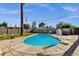 Inviting backyard with sparkling pool, basketball court, hot tub, palm tree, and comfortable lounge area at 4216 N 20Th St, Phoenix, AZ 85016