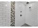 Sleek walk-in shower with subway tile and mosaic accents at 4216 N 20Th St, Phoenix, AZ 85016