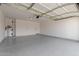 Spacious garage features an epoxy floor and ample room for parking at 4387 E Hartford Ave, Phoenix, AZ 85032