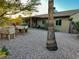 Expansive backyard featuring gravel ground covering and ample gardening and patio space at 4901 W Corrine Dr, Glendale, AZ 85304