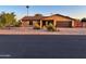 Charming single-story home with a two-car garage, desert landscaping, and a welcoming entrance at 4901 W Corrine Dr, Glendale, AZ 85304