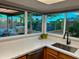 Bright kitchen showcasing quartz countertops, modern fixtures, and a view of the backyard at 4901 W Corrine Dr, Glendale, AZ 85304
