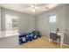 Bedroom with neutral carpet, ample light, and simple décor at 514 N 112Th Dr, Avondale, AZ 85323