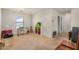 A cozy bonus room with neutral carpet, natural light, and versatile space at 514 N 112Th Dr, Avondale, AZ 85323