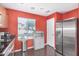 Modern kitchen featuring sleek stainless steel appliances and ample natural light at 514 N 112Th Dr, Avondale, AZ 85323