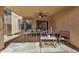 Covered patio with ceiling fan, furniture and access to the home's interior at 514 N 112Th Dr, Avondale, AZ 85323