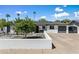 Beautiful single-story house with a well-maintained front yard and an inviting facade at 5320 E Thomas Rd, Phoenix, AZ 85018