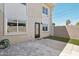 Backyard features hardscape, string lights, and a small patch of grass at 610 E Montebello Ave # 46, Phoenix, AZ 85012