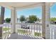 Charming balcony view with white railings and brick columns at 610 E Montebello Ave # 46, Phoenix, AZ 85012