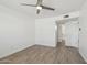Large primary bedroom features a fan, updated floors and leads to ensuite bathroom at 610 E Montebello Ave # 46, Phoenix, AZ 85012