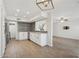 Modern kitchen featuring white cabinets, updated appliances, sleek countertops, and decorative backsplash for a modern touch at 610 E Montebello Ave # 46, Phoenix, AZ 85012
