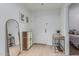 Bright entryway with wood floors, stylish mirror and decor at 6940 E Cochise Rd # 1027, Paradise Valley, AZ 85253