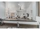 Bright living space with a pass-through to the kitchen and a view of the adjacent dining and living areas at 6940 E Cochise Rd # 1027, Paradise Valley, AZ 85253