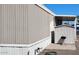 Exterior shot featuring siding, shed, and yard with grill at 730 S Country Club Dr # 81, Mesa, AZ 85210