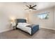 Comfortable bedroom with a tufted headboard, neutral color palette, and natural light at 735 E Northern Ave, Phoenix, AZ 85020