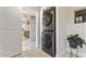 Convenient laundry area with stacked washer and dryer, next to the kitchen at 735 E Northern Ave, Phoenix, AZ 85020