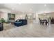 Spacious open-concept living area with modern finishes, a fireplace accent wall, and an adjacent kitchen at 735 E Northern Ave, Phoenix, AZ 85020