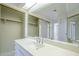 Bright bathroom with a large mirror, single sink vanity and ample storage at 839 S Westwood -- # 170, Mesa, AZ 85210