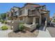 Charming condo building showcasing well-maintained landscaping, with a private patio and balcony space at 839 S Westwood -- # 170, Mesa, AZ 85210