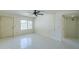 Spacious living room with tiled floor, a ceiling fan and lots of natural light at 839 S Westwood -- # 170, Mesa, AZ 85210