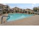 Large community pool surrounded by lounge chairs and landscaping in a well-maintained apartment complex at 839 S Westwood -- # 170, Mesa, AZ 85210
